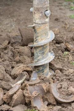 Construction machine for drilling holes in the ground Stock Photos