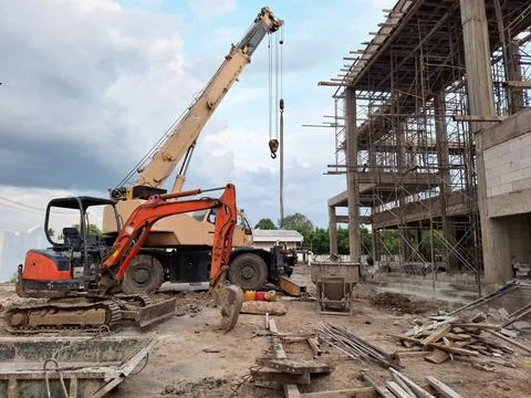 Construction machine excavator and crane. Stock Photos
