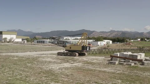 Construction Machine near wine fields an mountains 库存影片 125456016