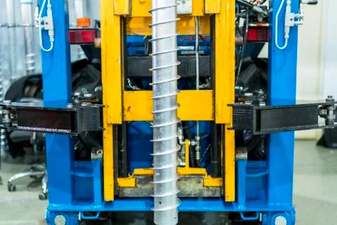 Construction machine for piling the piles into the ground Stock Photos