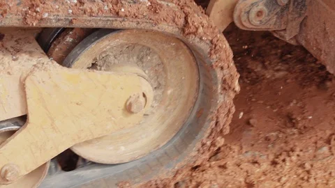 Construction Machinery Drives Through Mud And Dirt Stock Footage 87482087