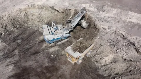 Construction machinery loading coal in a coal mine Stock Footage 294099877