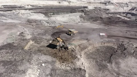 Construction machinery loading coal in a coal mine  Video stock 294099923
