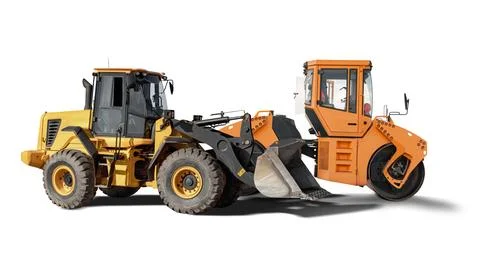 Construction machinery stands isolated, featuring a loader and a road roller  Photos