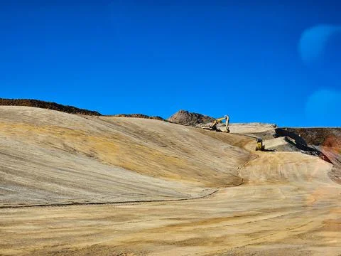Construction machinery working in mine Stock Photos