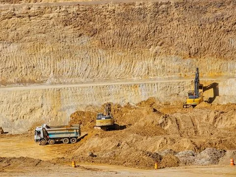 Construction machinery working in mine Stock Photos
