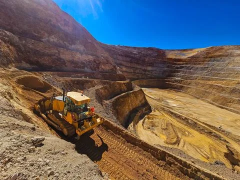 Construction machinery working in open pit mine Stock Photos