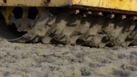 Construction machinery works on a road construction site in winter Stock Footage 115925328