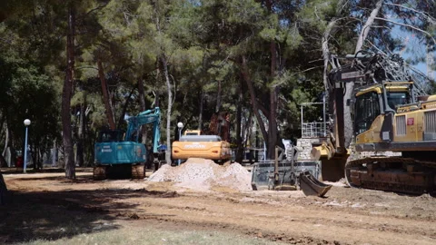 Construction machines in the park Stock Footage 132303825