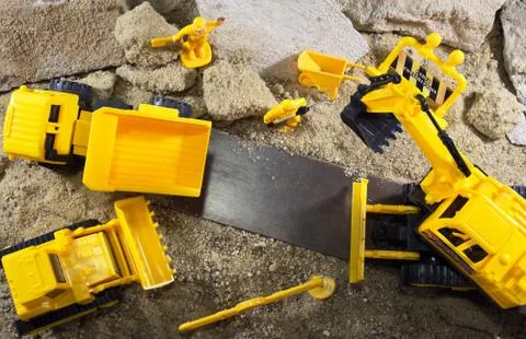 Construction machines &amp; worker toys upper view. Stock Photos