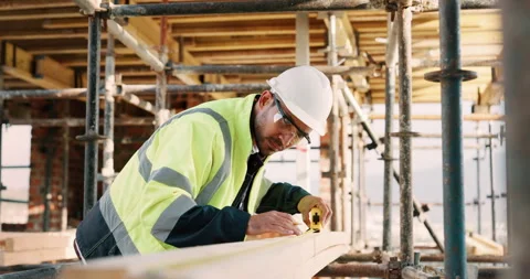 Construction, man and tape measure with wood for development, building and Stock Footage 336204567
