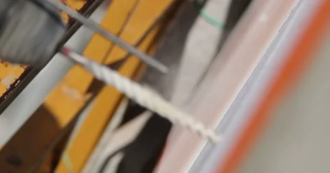 Construction. Man drills wall with perforator. Close-up. Stock Footage 53857365