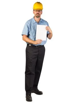Construction man standing and holding a blank document Stock Photos