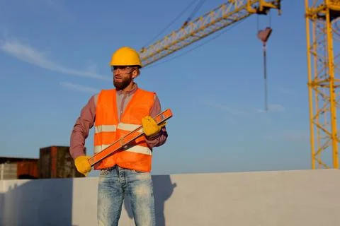 Construction manager and engineer discussing building project on site with .. Stock-Fotos