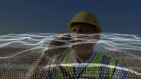Construction manager calling on phone, gesturing through data wave, directing Stock Footage 314687865