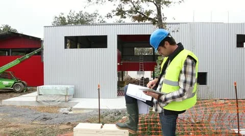 Construction manager using electronic tablet on site Stock Footage 18194833
