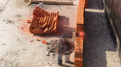 Construction mason worker bricklayer installing red brick timelapse Stock Footage 57533704