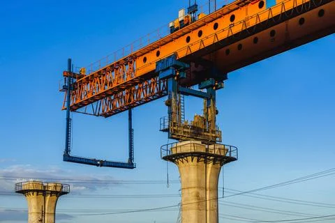 Construction of massive elevated railway viaduct using  gantry crane for gi.. Stock Photos