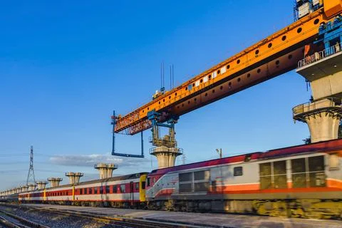 Construction of massive elevated railway viaduct using  gantry crane for gi.. Stock Photos