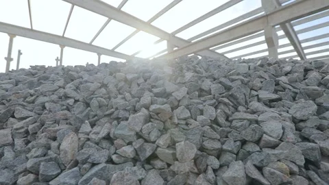 Construction material at the construction site. A pile of granite stone at a Stock Footage 169036506