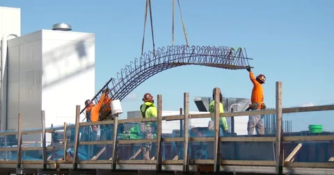 Construction - Material Lowered by Crane - 4k Stock Footage 61332330