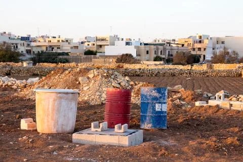Construction material in a Maltese field Stock Photos