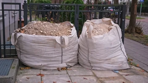 Construction Materials Garbage Bag Filled with Cement and Concrete Rubble 動画素材 296513422