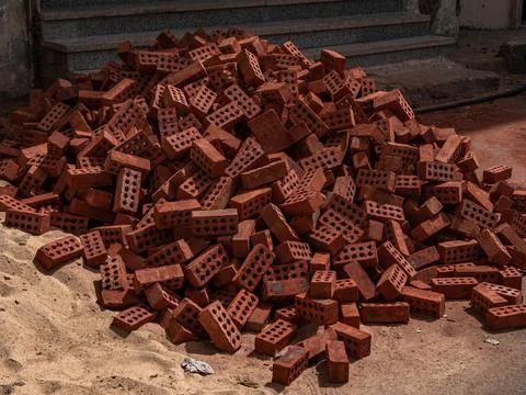 Construction Materials. Red building brick made of baked clay Stock Photos