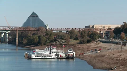Construction on the Memphis Pyramid and an old riverboat Stock Footage 58158755