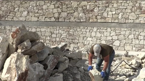 Construction men building a stone wall Stock Footage 196243020
