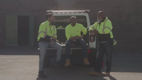 Construction Men Hang Out On Back Of Truck Stock Footage 270389850