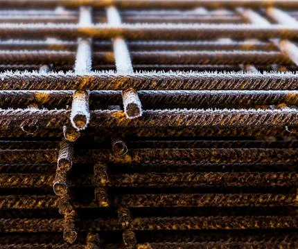 Construction metal frame with small ice particles Stock Photos