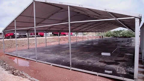 Construction of metal structure tent for events Stock Footage 71324096