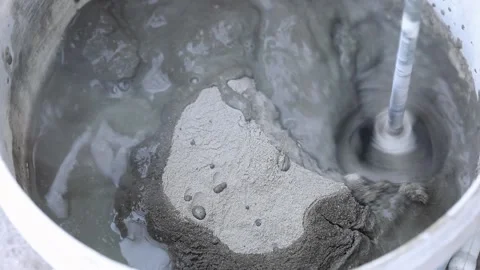 Construction mixer interferes with putty Stock Footage 221479954