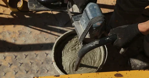 Construction. Mixing solution. Stockbeeldmateriaal 53857541