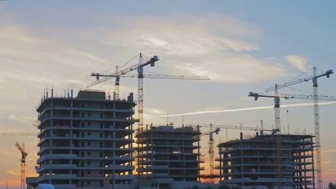 Construction of modern buildings with tower cranes. Timelapse Stock Footage 76615425