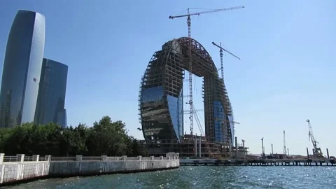 Construction of a modern glass building called "Crescent Project" Video stock 137296224