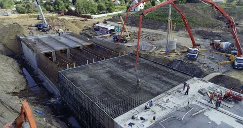 Construction of a monolithic structure Stock Footage 93174890