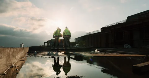 Construction, motivation or team on site with support, task completion or Stock Footage 336204520