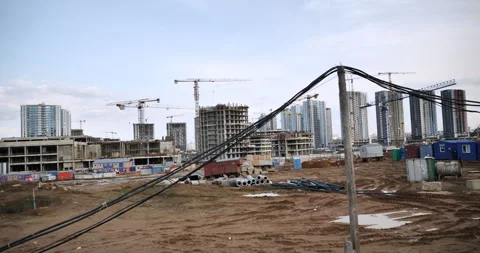 Construction of a multi-family district of the city. wasteland of construction Stock Footage 244746331