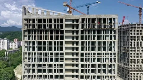 Construction of a multi-storey apartment building. Aerial video. 動画素材 237929530