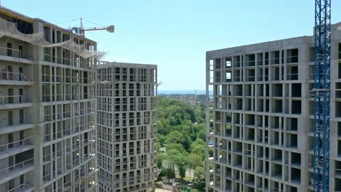 Construction of a multi-storey apartment building. Aerial video. 動画素材 237929613