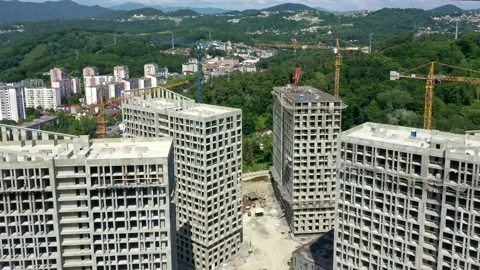 Construction of a multi-storey apartment building. Aerial video. 動画素材 238016106