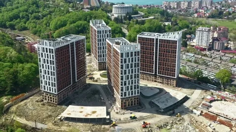 Construction of a multi-storey apartment building. Aerial video. 動画素材 238736515