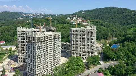 Construction of a multi-storey apartment building. Aerial video. 動画素材 238736577