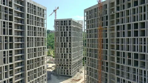 Construction of a multi-storey apartment building. Aerial video. Vidéo 238827332