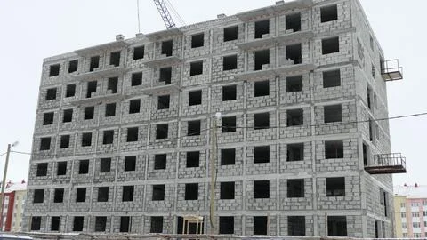 Construction of a multi-storey brick house Stock Photos