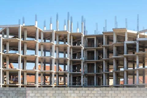 Construction of a multi-storey building. Concrete floors are clearly visible Stock Photos