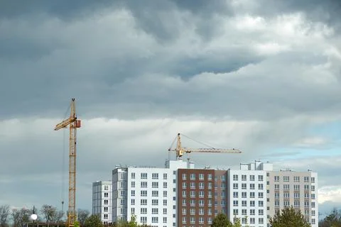 Construction of a multi-storey building. Modern high-rise building. Residential Stock Photos