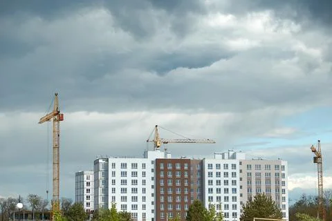 Construction of a multi-storey building. Modern high-rise building. Residential Stock Photos